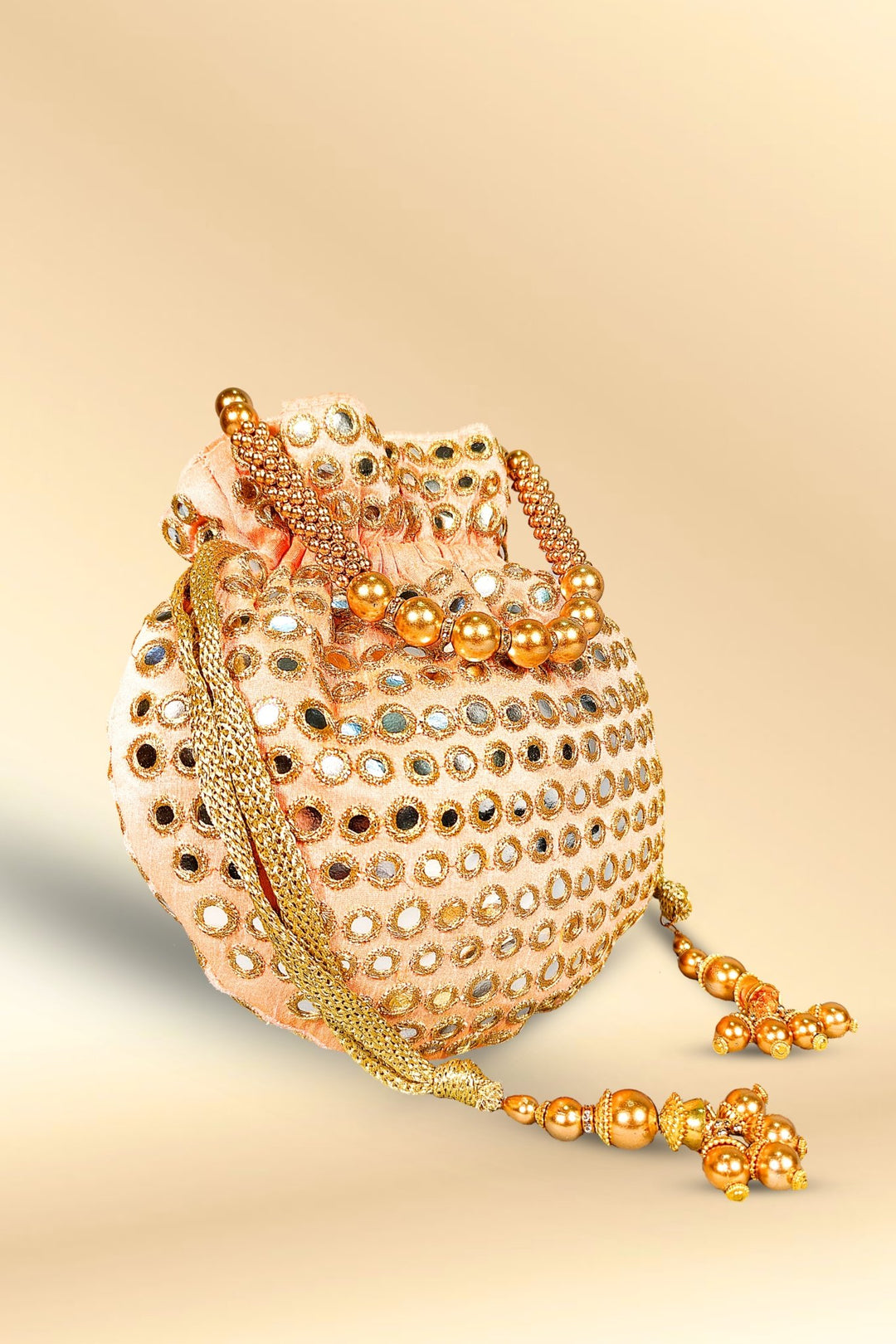 peach mirror work potli bag